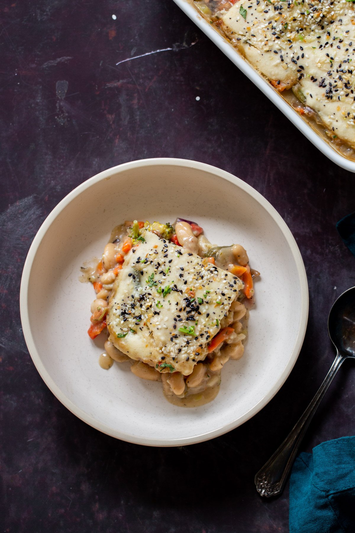 plate of everything bagel pot pie next to the baking pan