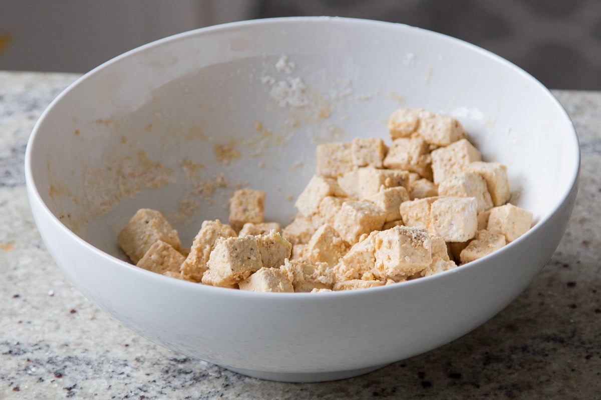 tofu fully coated in the cornstarch and baking powder