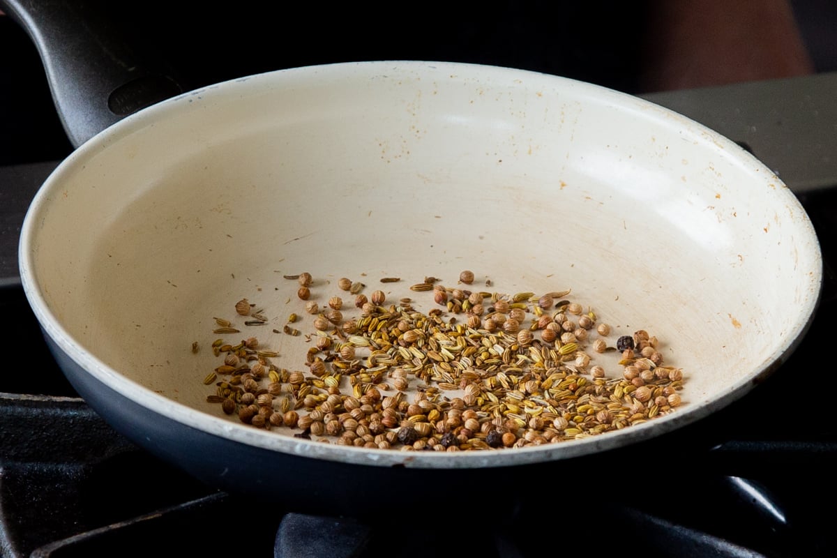 whole spices in the pan, after toasting