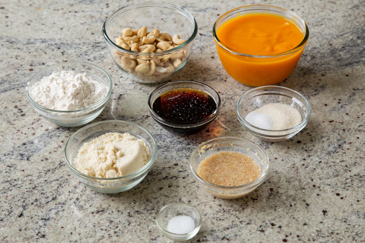 mango puree and other mango bar ingredients in bowls on a kitchen counter