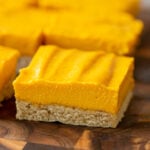 close-up of sliced mango bars on a cutting board
