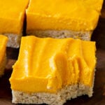 close-up of a mango bar with a bite taken out, so you can see the texture