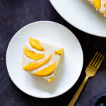slice of mango tiramisu on a white plate
