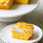 slice of mango tiramisu on a white plate