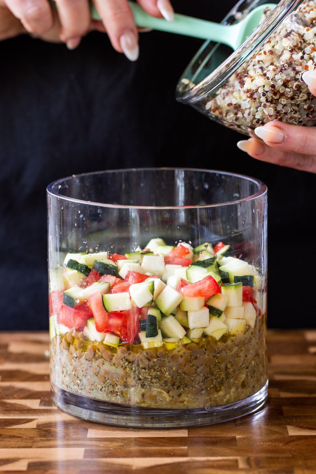 adding quinoa layer to the salad