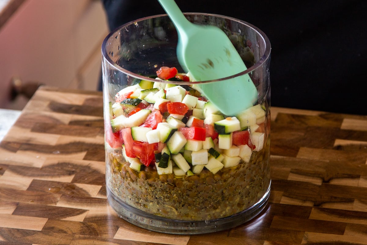 adding zucchini-tomato layer to the salad