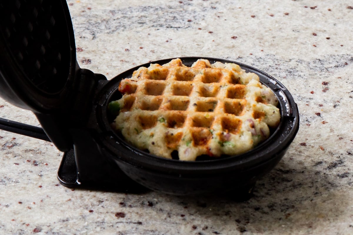 rava idli waffle in the waffle maker, after cooking