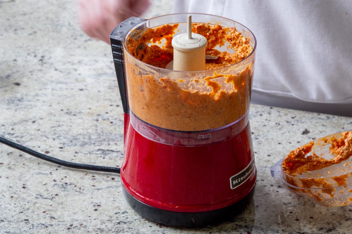 food processor with the romesco sauce in it