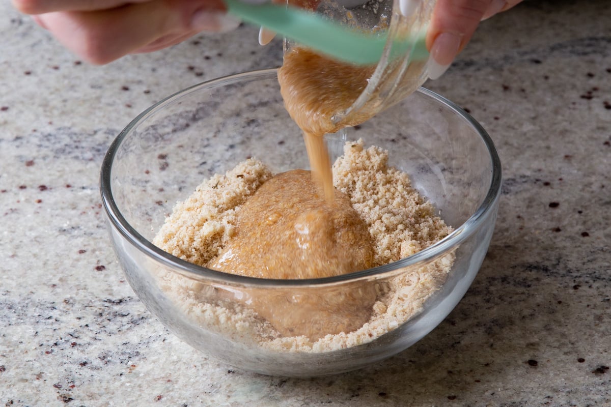 adding wet crouton ingredients to the dry ingredients