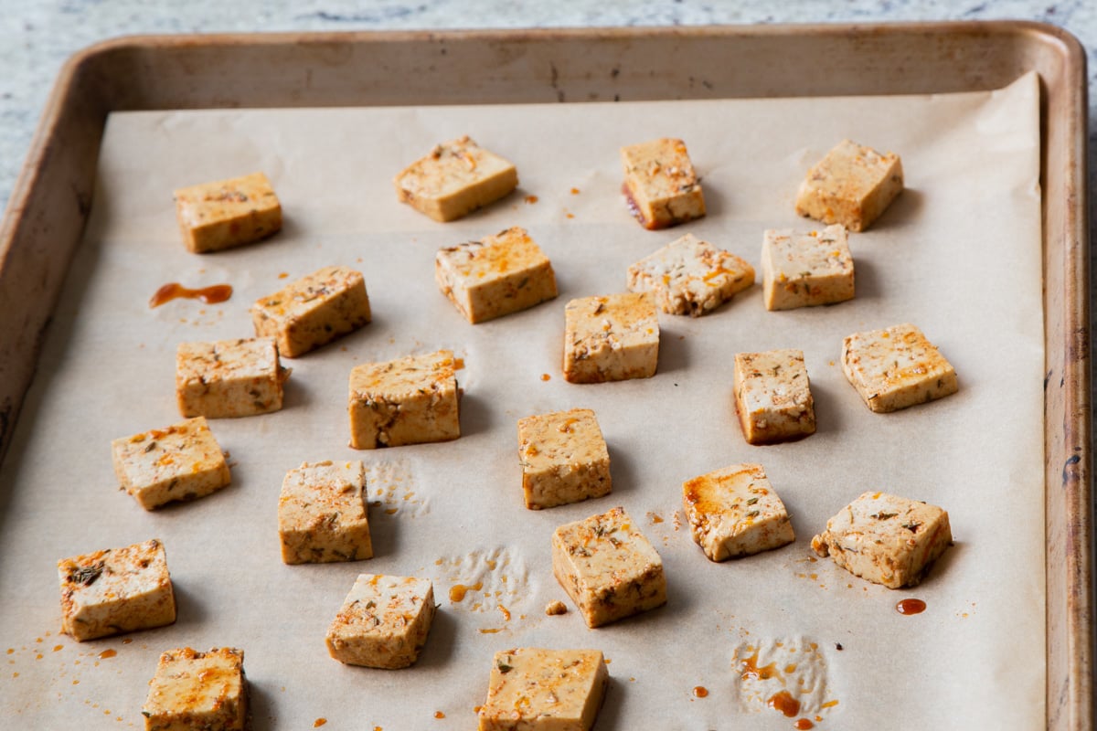 smoky tofu on the baking sheet before baking