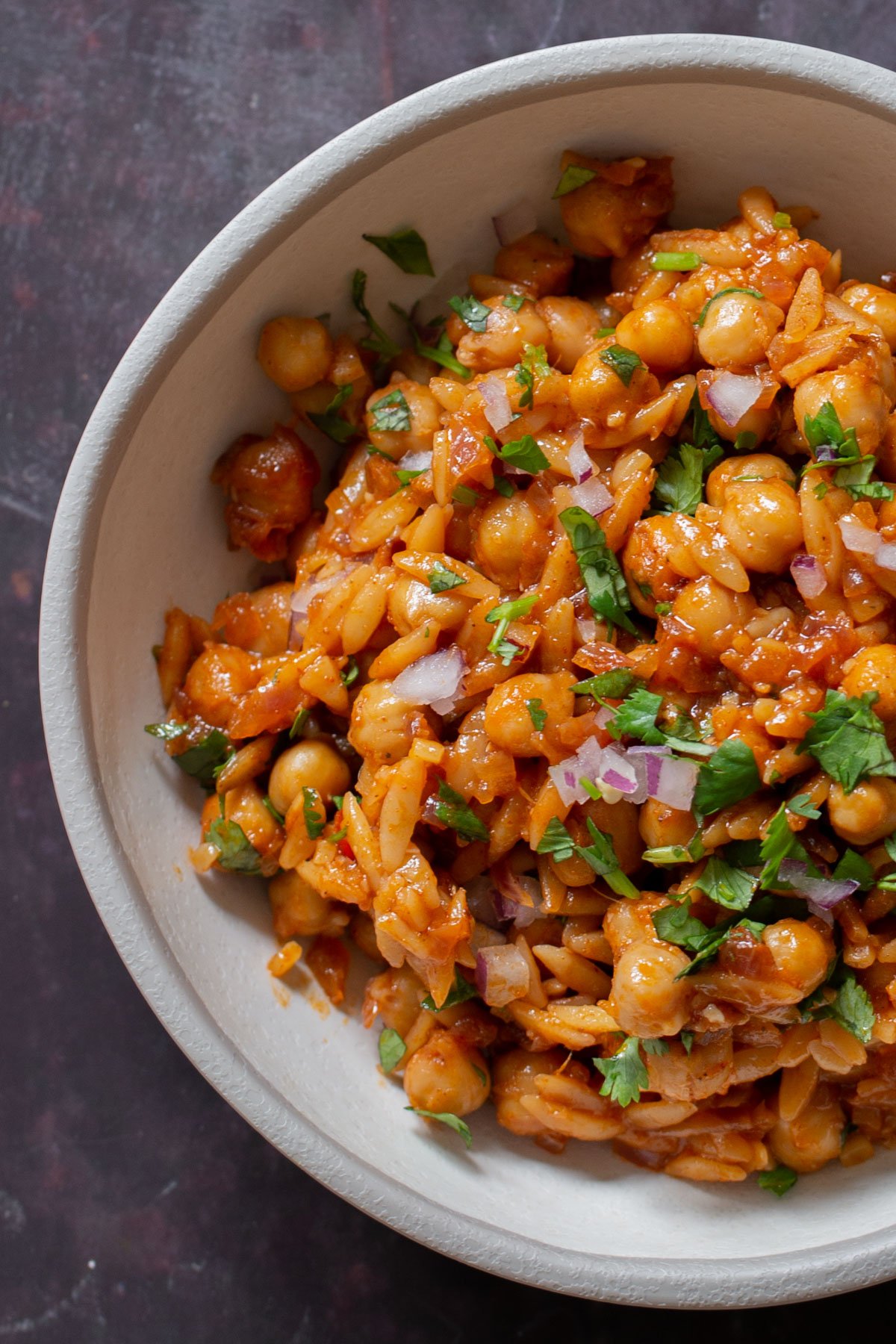 close-up of cajun orzo in a bowl