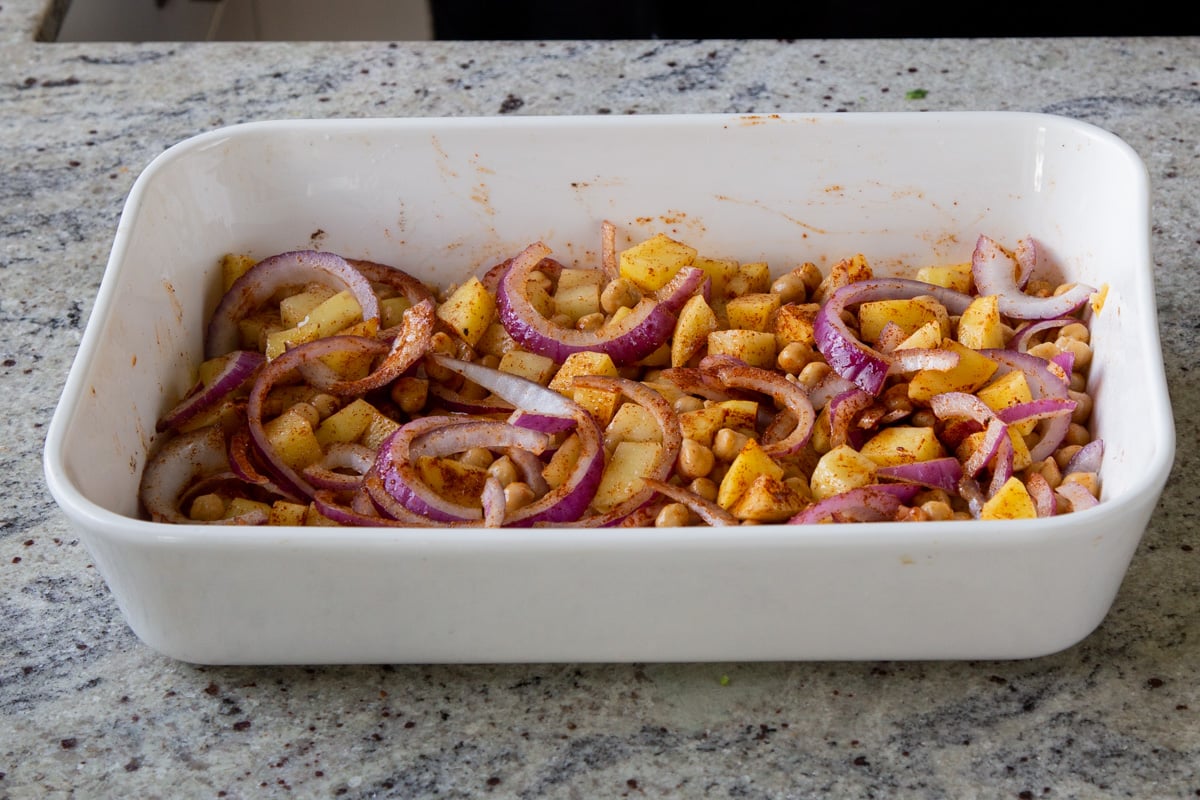 chickpeas, onions, and potatoes after tossing with spices