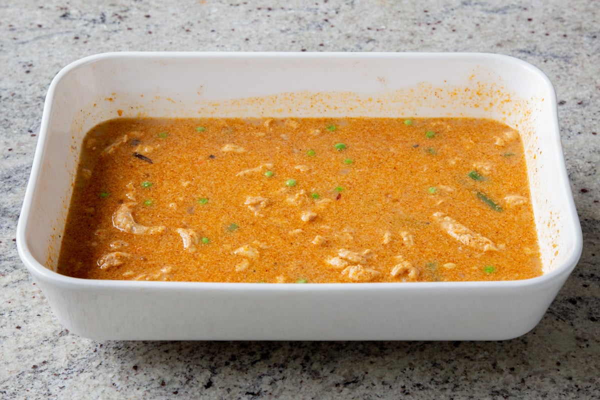 curry mixture after stirring in the water, veggies, lentils, soy curls, and coconut milk, before baking