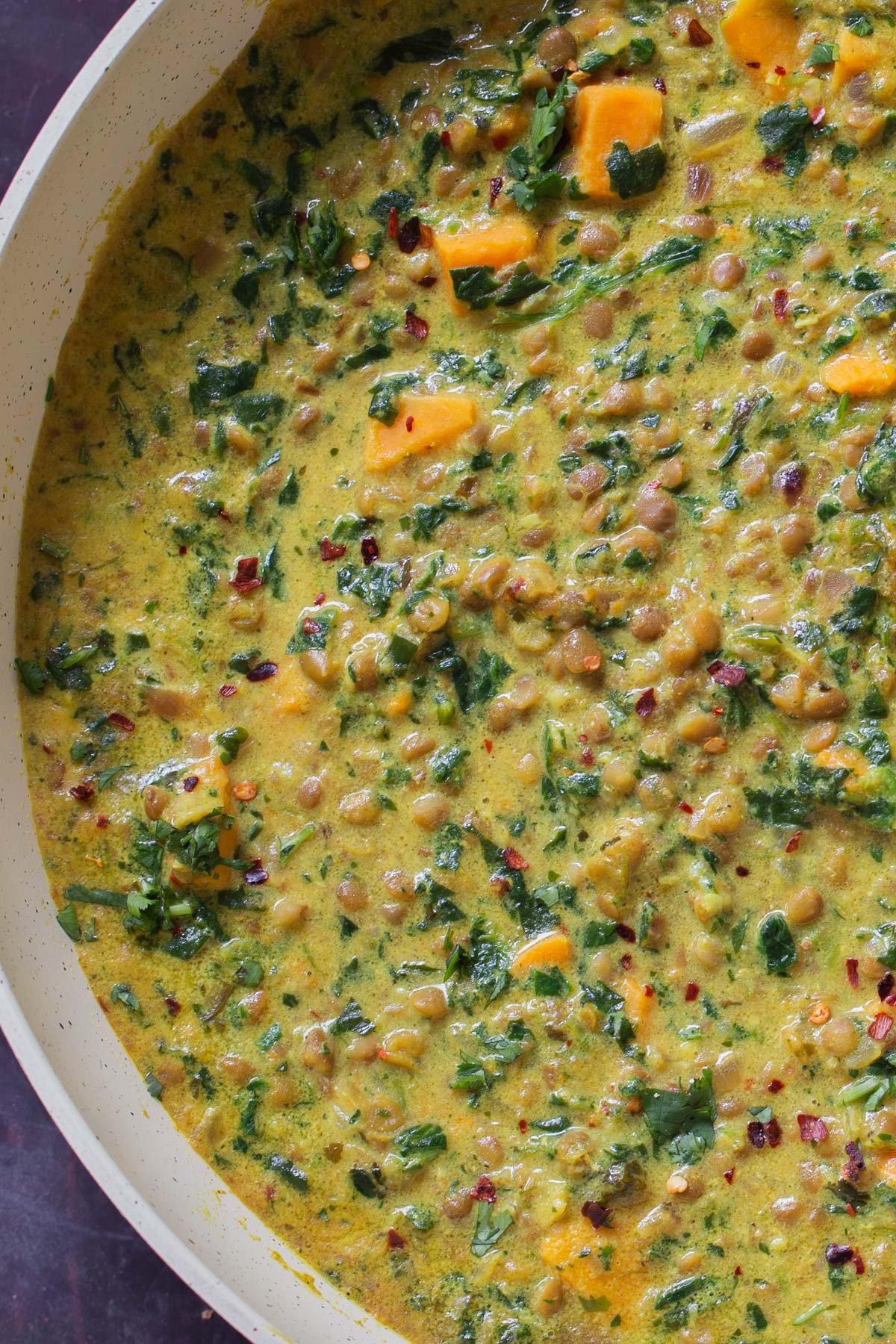 close-up of lentil coconut curry in the pan