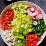 tofu, cilantro, and veggies in the mixing bowl before mixing