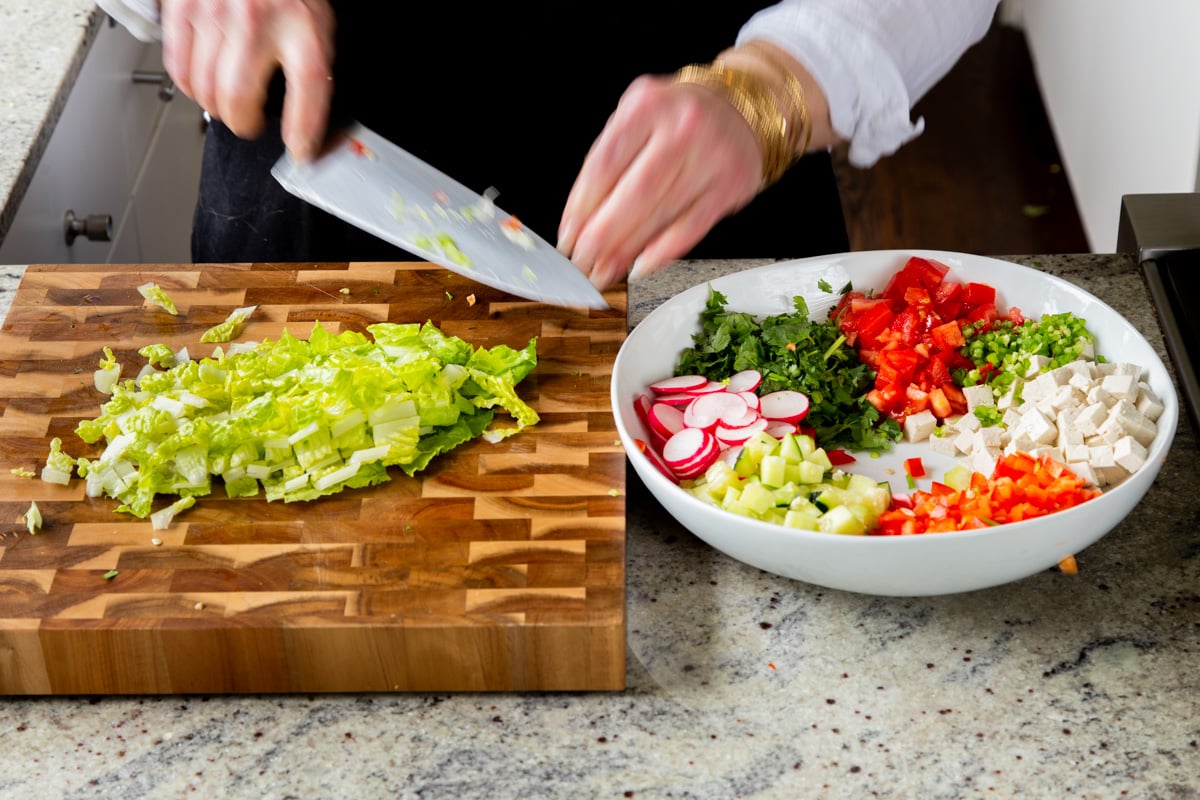 chopping the lettuce