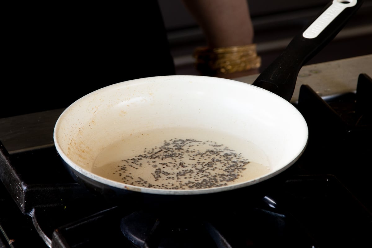 mustard seeds in the frying pan