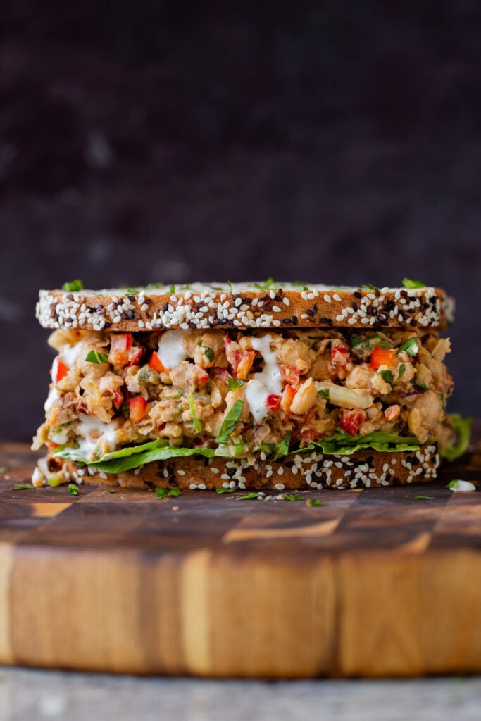 cajun chickpea salad in a sandwich with lettuce