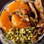 close-up of cannoli overnight oats topping: oranges, pistachios, and crispy cinnamon sugar tortilla pieces