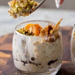 spoon taking a bite of cannoli overnight oats