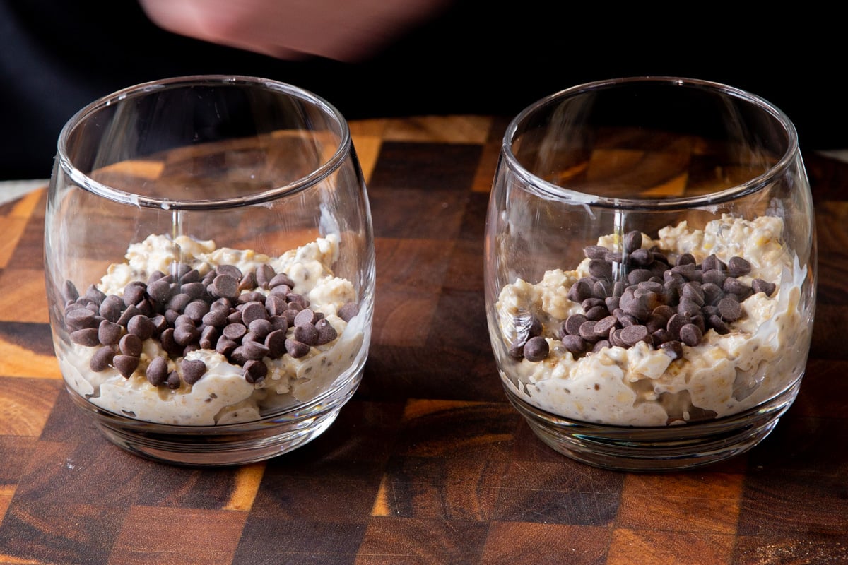 oat mixture topped with chocolate chips in glass cups