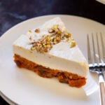 close-up of a slice of carrot halwa cheesecake