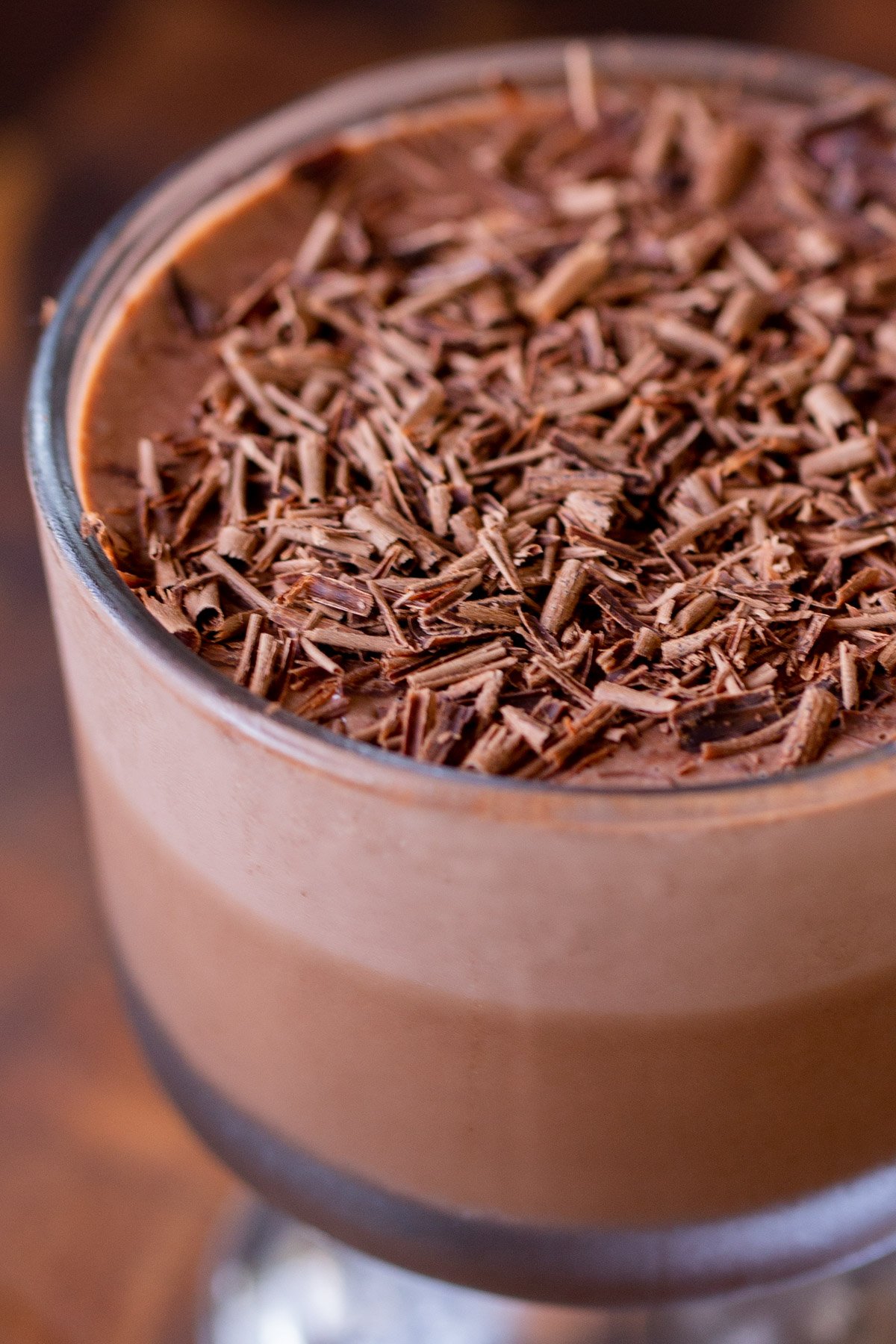close-up of vegan chocolate pudding with chocolate shavings on top