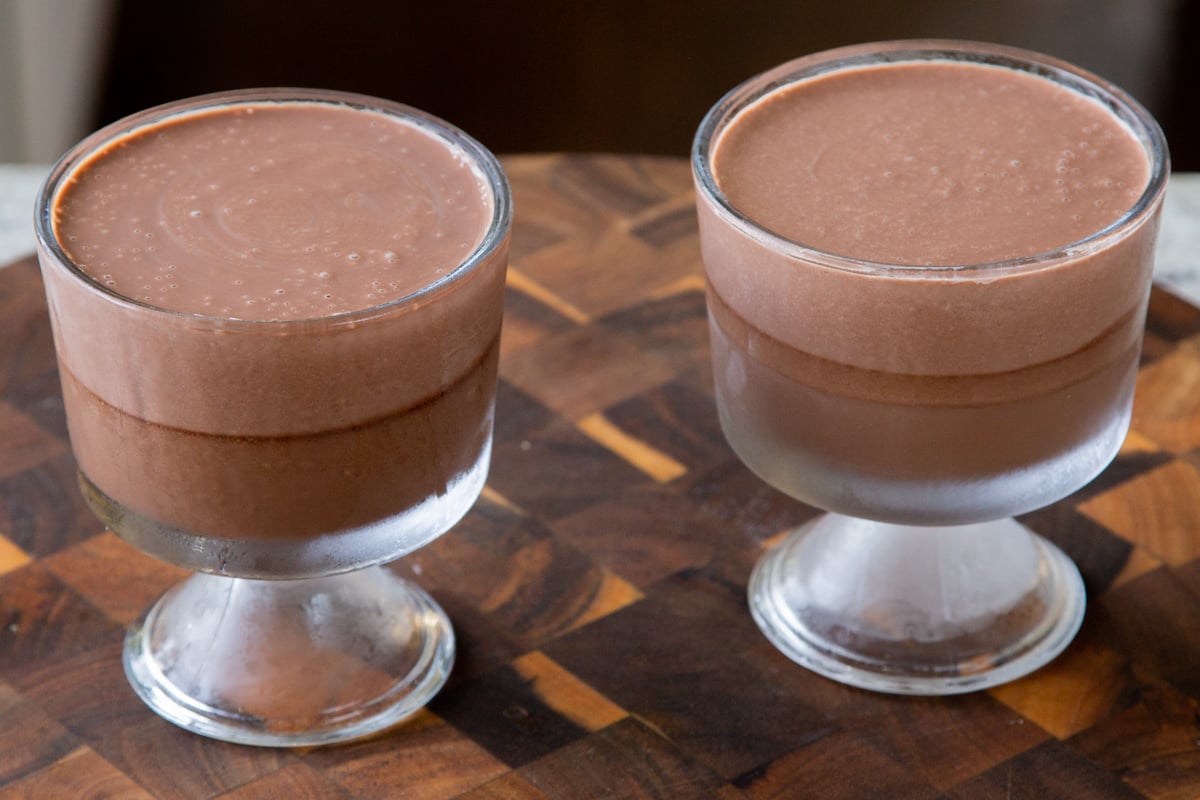 cups of two-layer vegan chocolate pudding