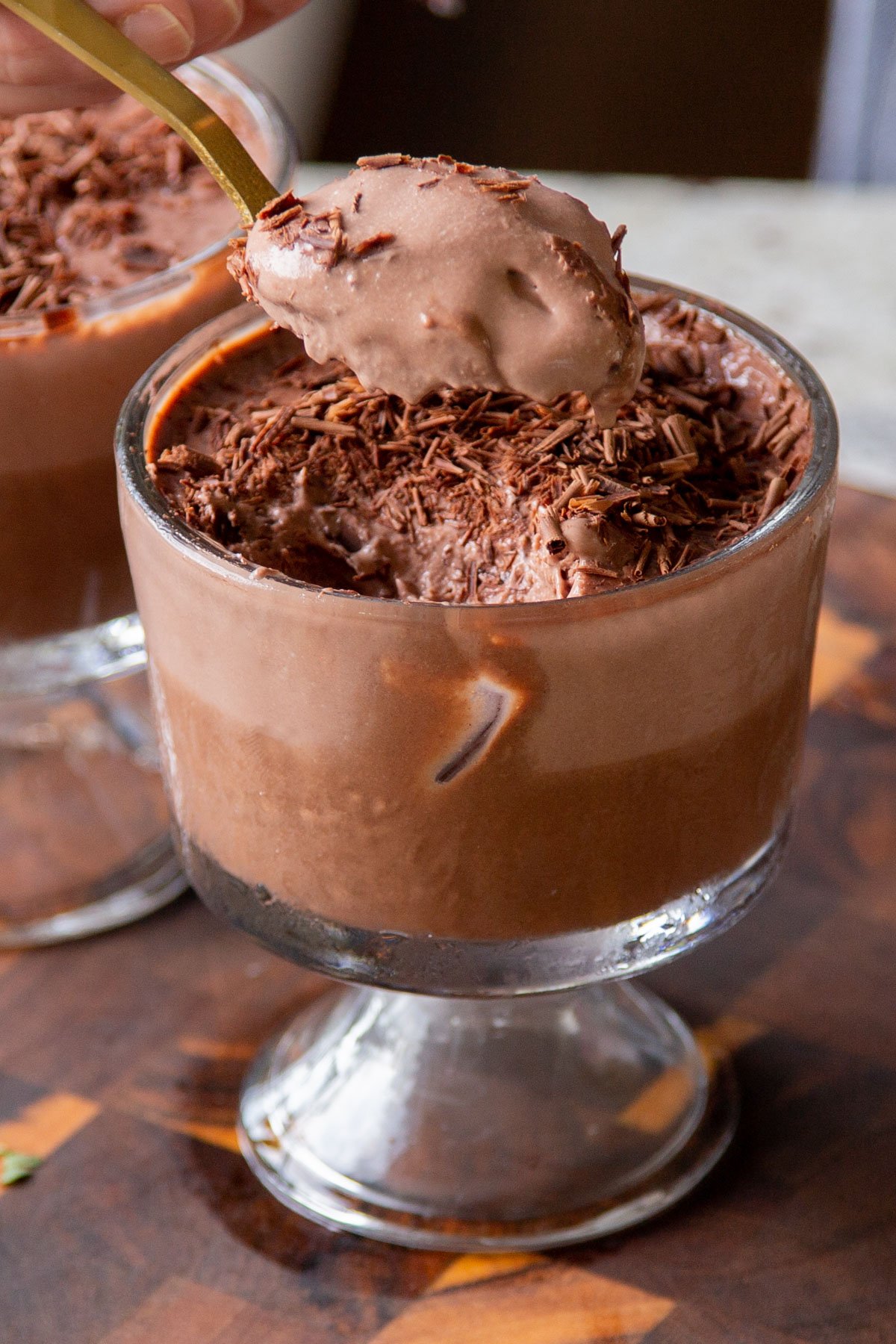 spoon taking a bite of vegan chocolate pudding