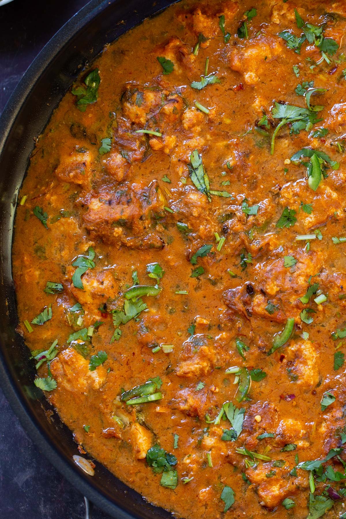 close-up of Hyderabadi chicken curry in the pan