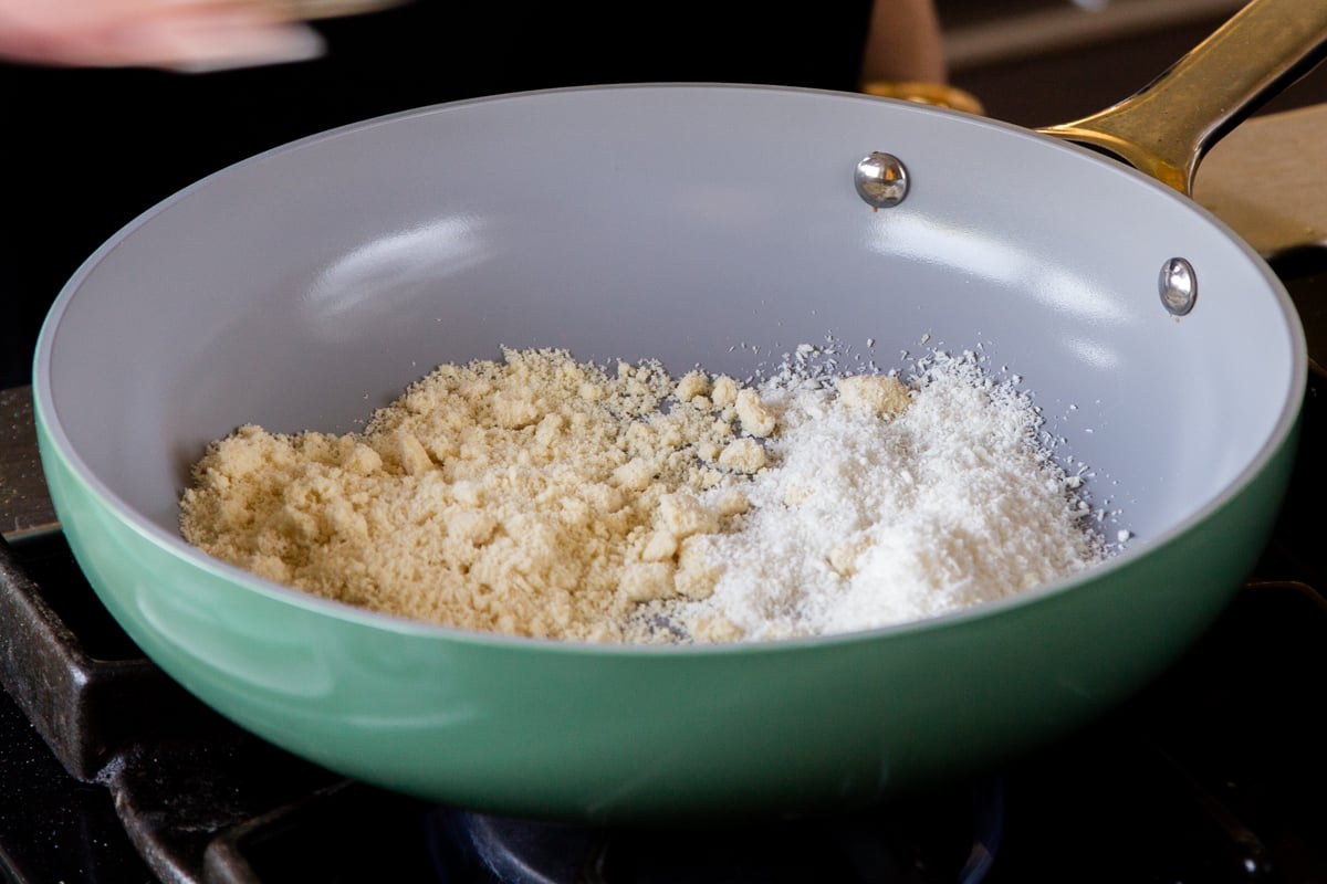 roasting the coconut and almond flour in the pan