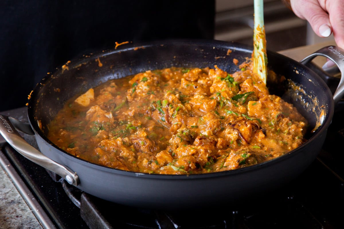 Hyderabadi chicken curry after mixing in the fresh herbs