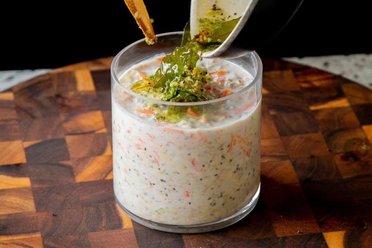 adding the tempering to the savory overnight oats