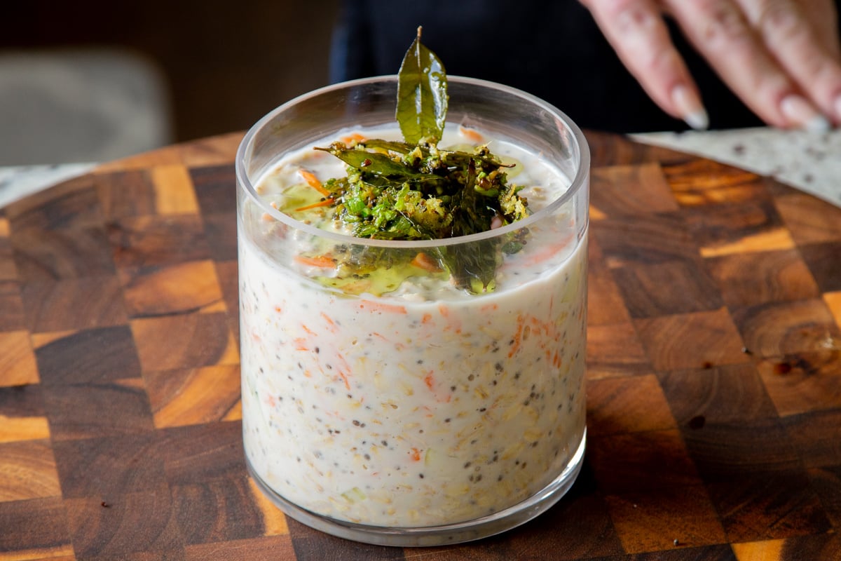 Indian spiced yogurt overnight oats topped with the tempering