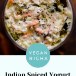 savory overnight oats topped with Indian spiced tempering in a glass jar, text overlay