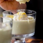 spoon taking a bite of lemon pudding