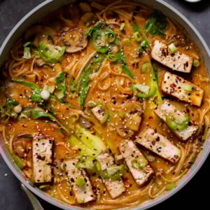 vegan tonkotsu in the pan after adding tofu and toppings