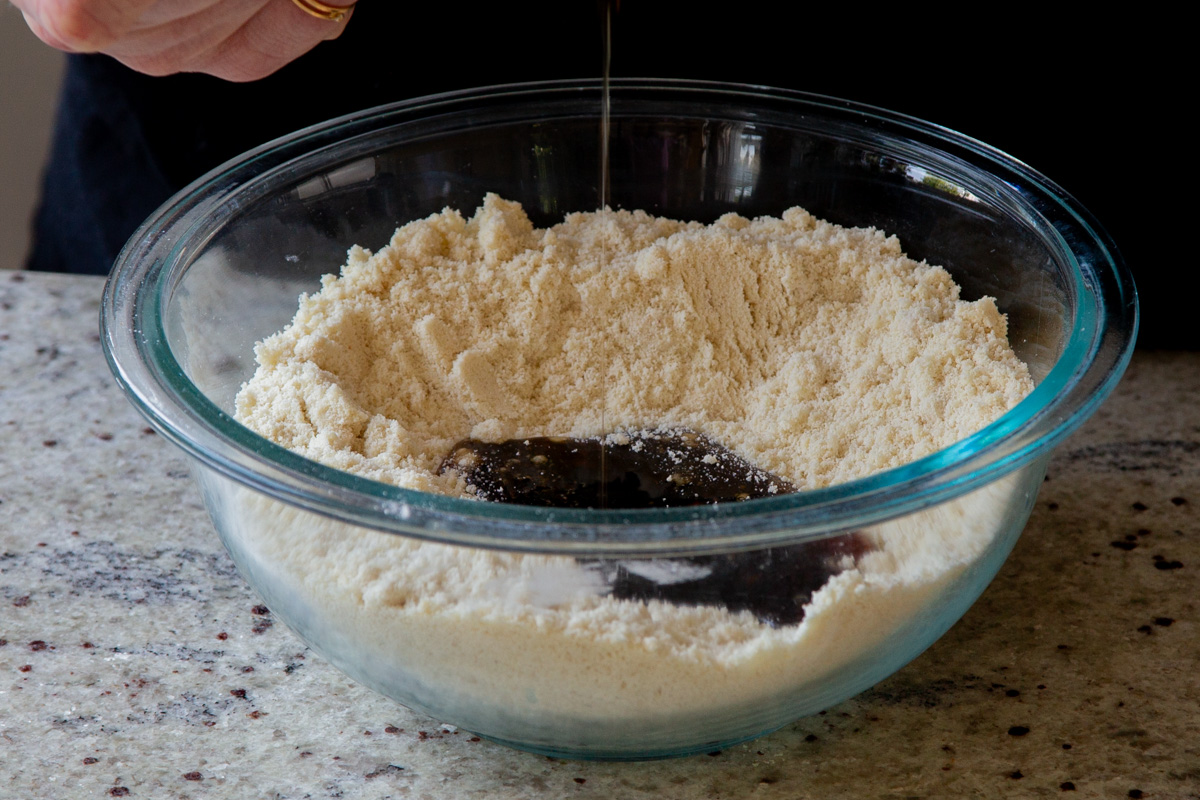 wet ingredients added to the dry in the mixing bowl