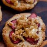 close-up of strawberry cheesecake cookies on a wooden serving tray