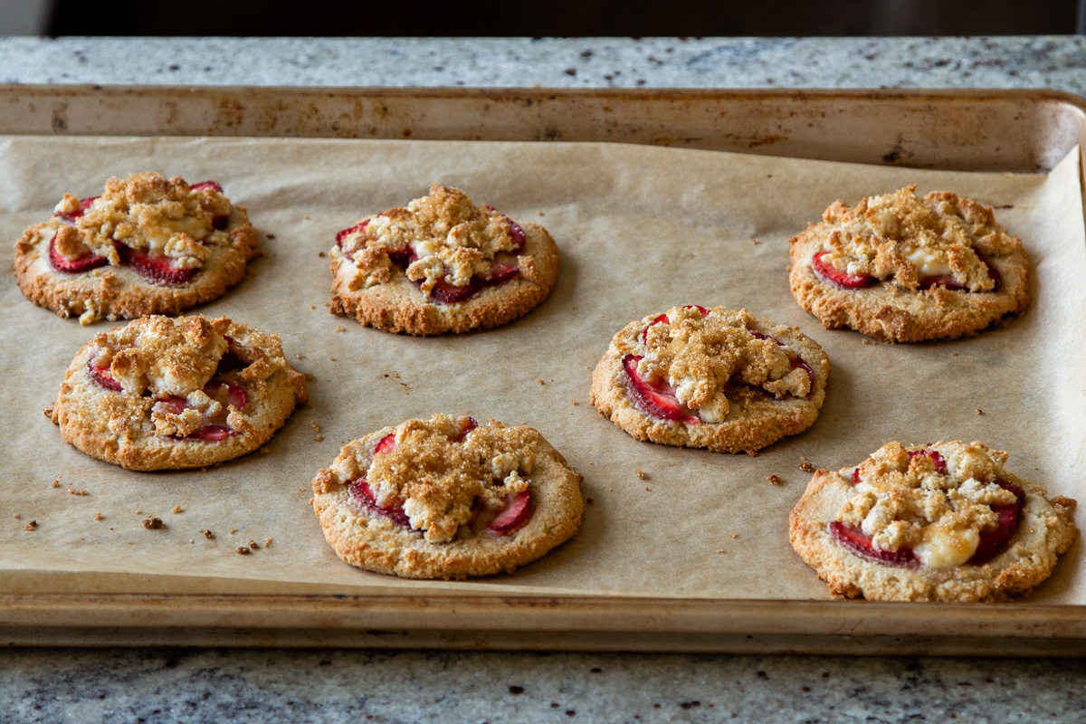 strawberry cheesecake cookies on the baking sheet, after baking