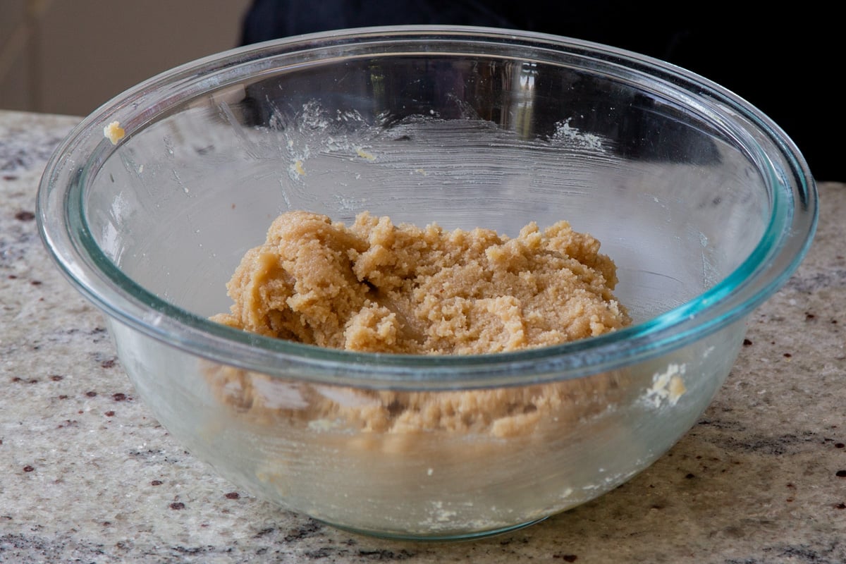 mixed cookie dough in a glass bowl