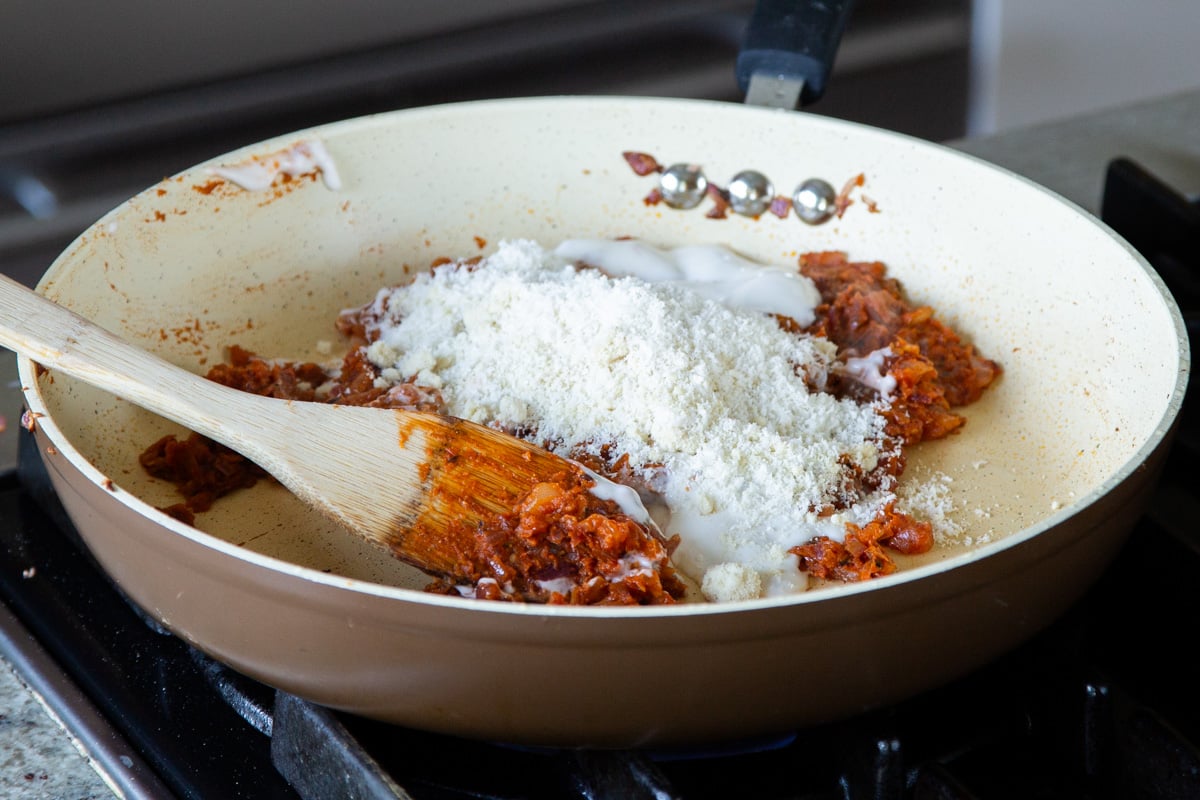 adding almond flour and coconut to the onion mixture