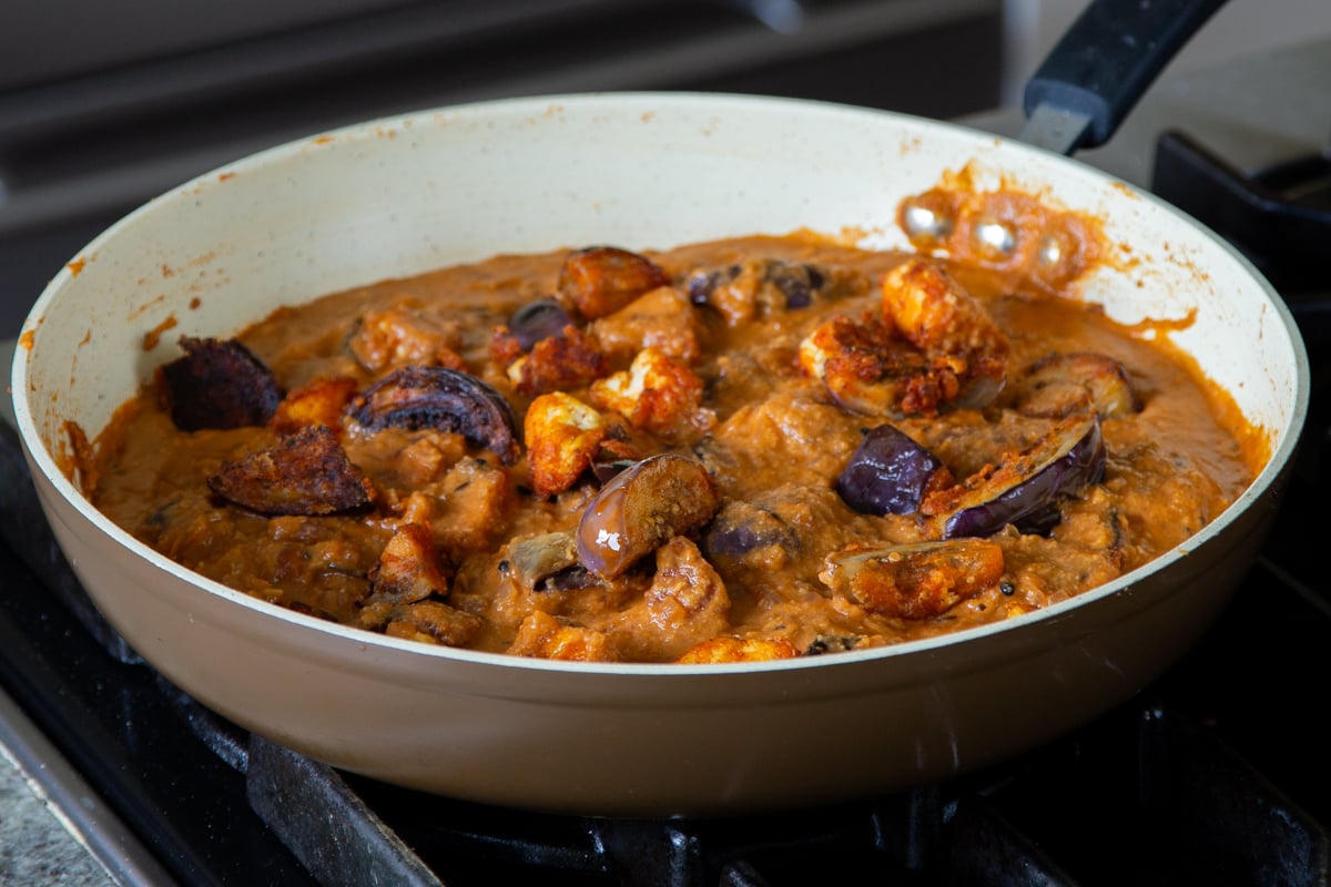 tofu eggplant curry in the pan, after mixing in