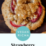 close-up of a strawberry cheesecake cookie on a wooden serving tray, text overlay
