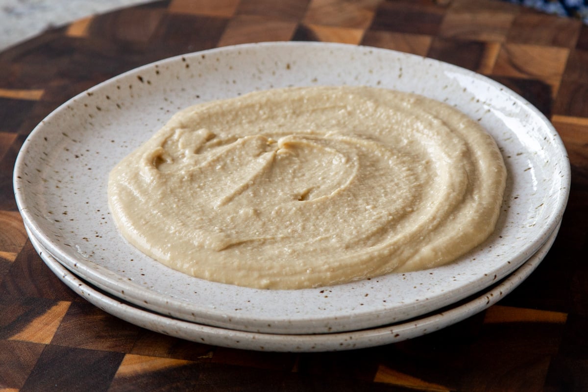 hummus spread onto a plate