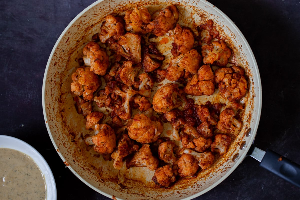harissa cauliflower in the pan, after cooking