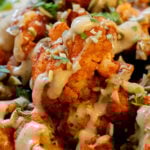 close-up of harissa cauliflower, so you can see the texture.