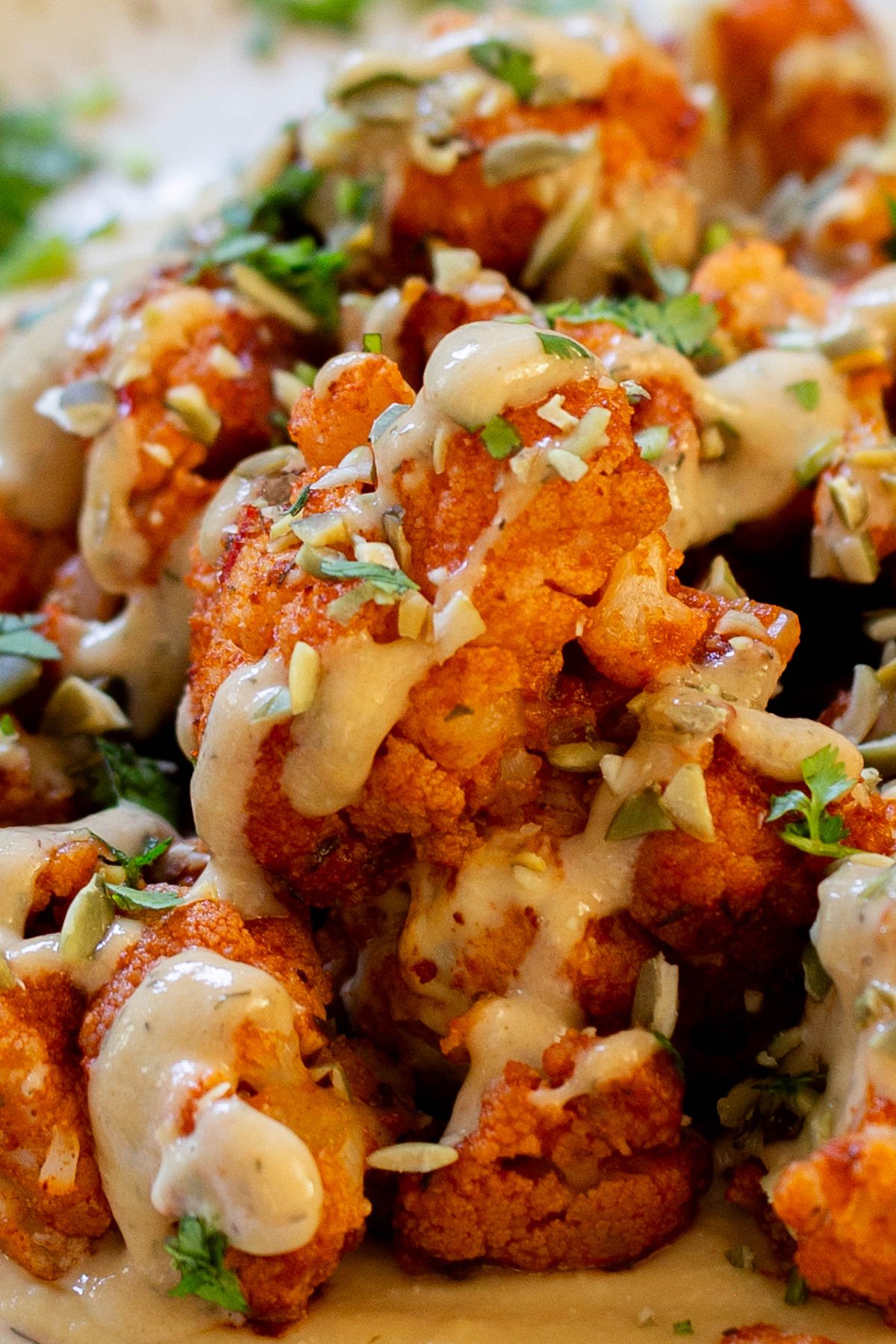 close-up of harissa cauliflower, so you can see the texture.