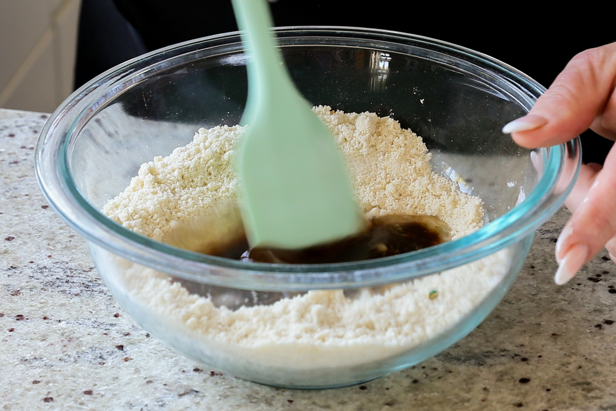 adding wet ingredients to the mixed up dry ingredients