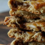 stack of halved tiramisu cookies, so you can see inside them